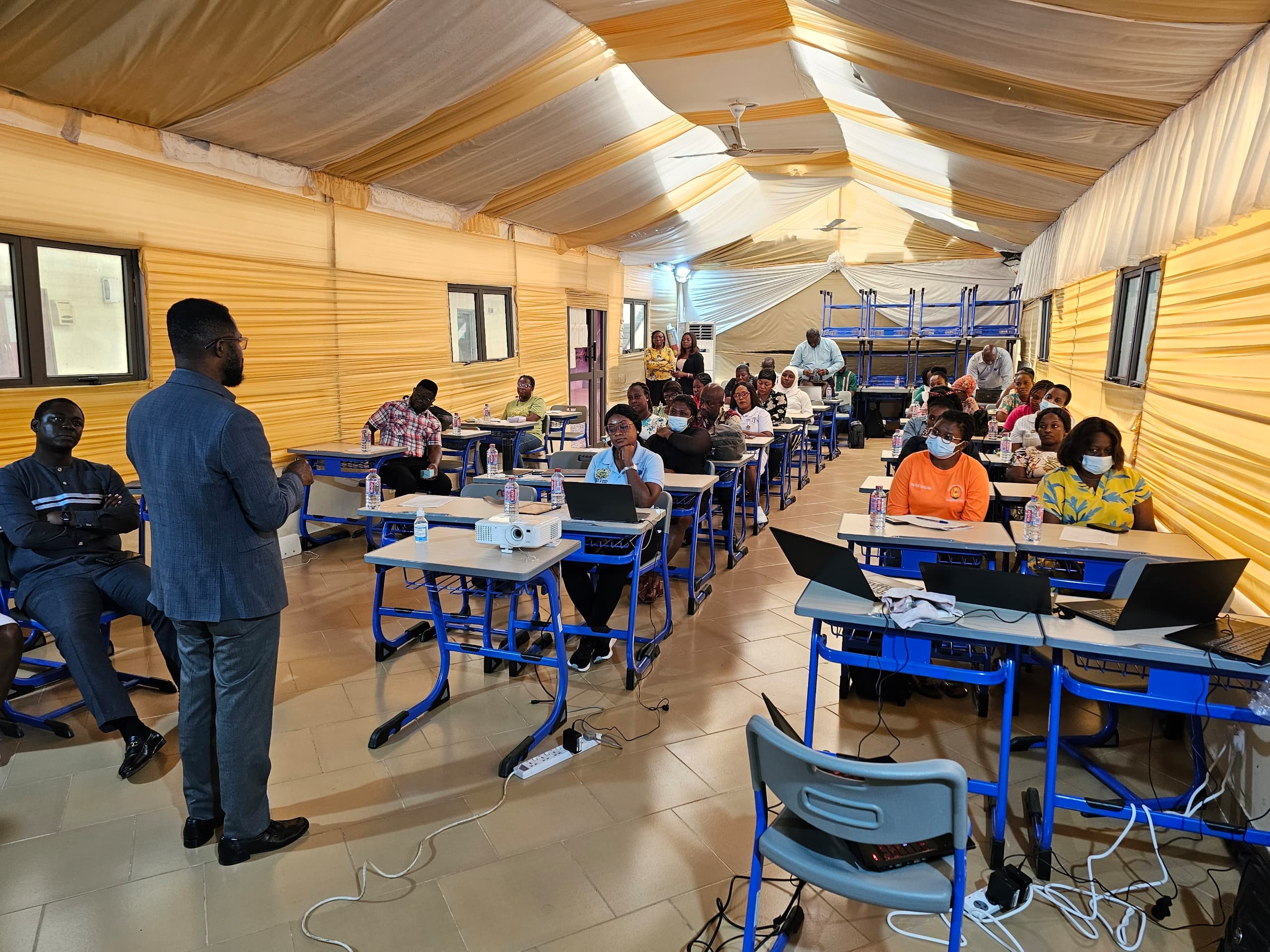 Participants following along during a LHIMS training session